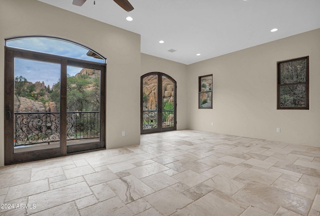 4393 N Twisted Trl, Prescott, AZ 86301 - empty room featuring stone tile flooring, recessed lighting, ceiling fan, and a wealth of natural light