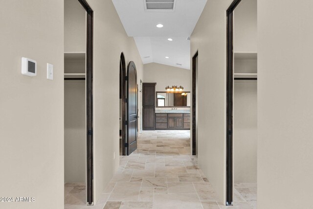 4393 N Twisted Trl, Prescott, AZ 86301 - hallway featuring recessed lighting, stone tile floors, vaulted ceiling, and visible vents