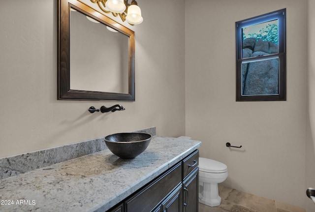 4393 N Twisted Trl, Prescott, AZ 86301 - half bath featuring an inviting chandelier, toilet, and vanity