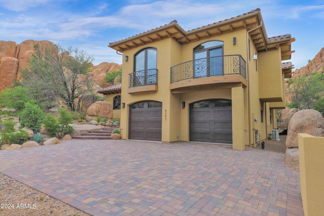 4393 N Twisted Trl, Prescott, AZ 86301 - mediterranean / spanish-style home with a balcony, a tile roof, decorative driveway, and stucco siding