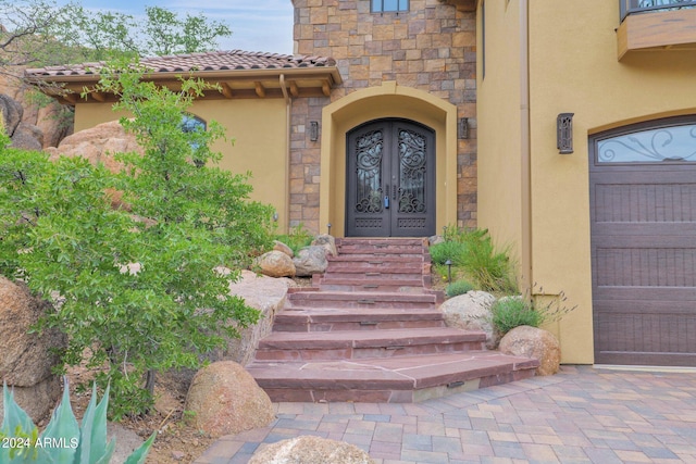 4393 N Twisted Trl, Prescott, AZ 86301 - doorway to property featuring stone siding, a tile roof, french doors, and stucco siding