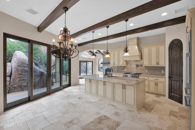4393 N Twisted Trl, Prescott, AZ 86301 - kitchen featuring a sink, backsplash, visible vents, cream cabinets, and custom range hood