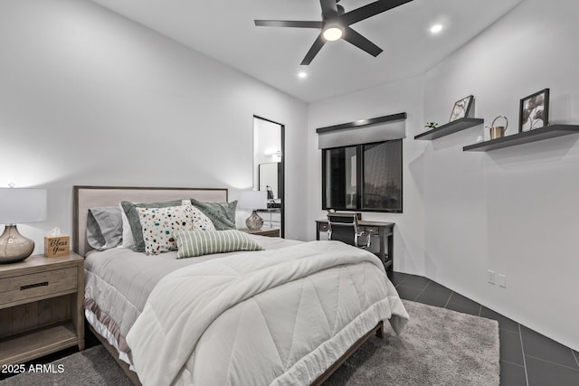 bedroom featuring recessed lighting, dark tile patterned flooring, and a ceiling fan