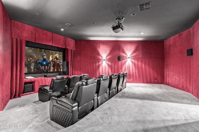 home theater room with visible vents and carpet floors