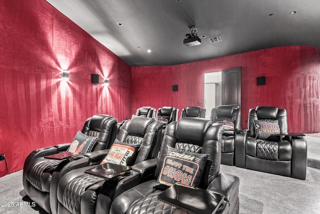 cinema room with carpet flooring and visible vents