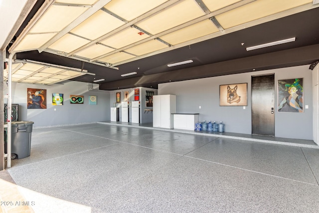 garage with baseboards