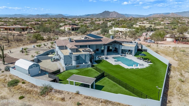 bird's eye view with a mountain view