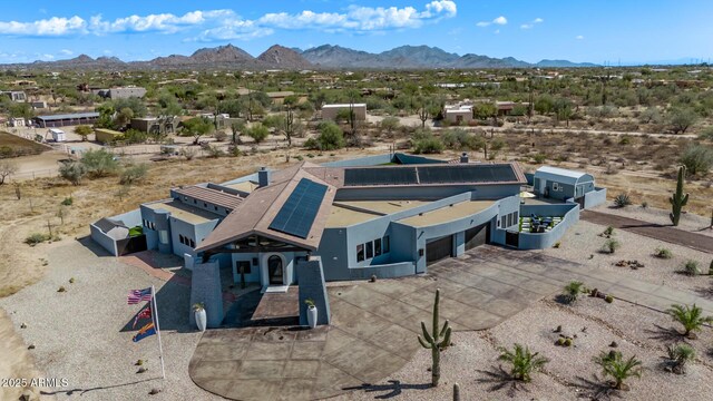 drone / aerial view featuring a mountain view