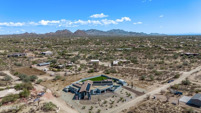 aerial view featuring view of desert and a mountain view