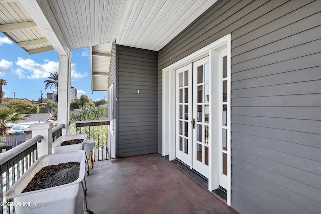 balcony featuring french doors