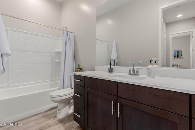 3852 E Bartlett Way, Chandler, AZ 85249 - bathroom featuring wood finished floors, toilet, shower / bath combo with shower curtain, and vanity