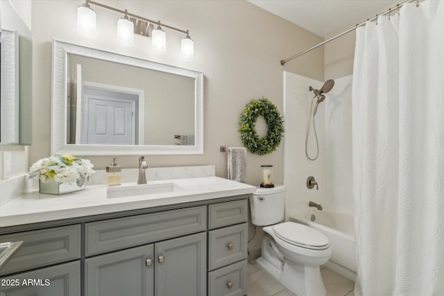 bathroom with shower / bath combo, vanity, toilet, and tile patterned floors