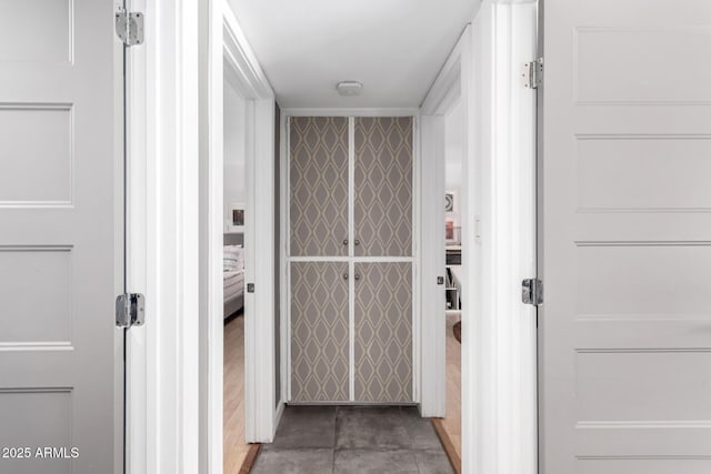 hall featuring tile patterned floors