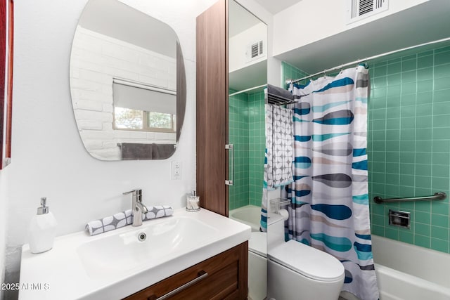 bathroom featuring toilet, vanity, visible vents, and shower / bathtub combination with curtain