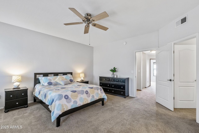 carpeted bedroom with a ceiling fan