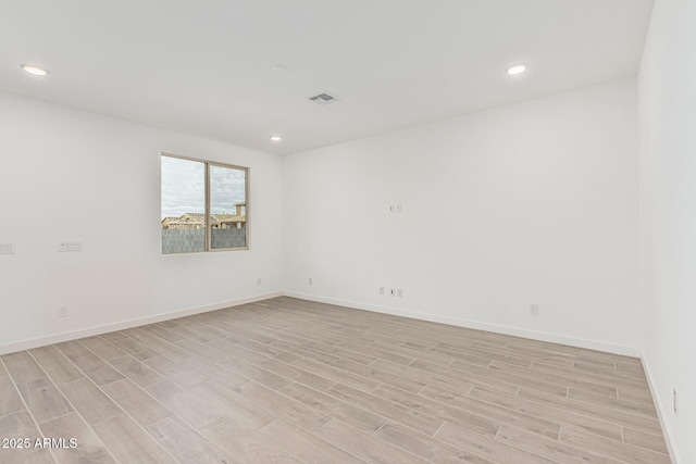 empty room featuring light hardwood / wood-style flooring