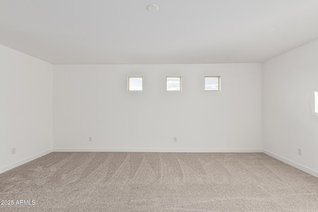 empty room featuring carpet floors