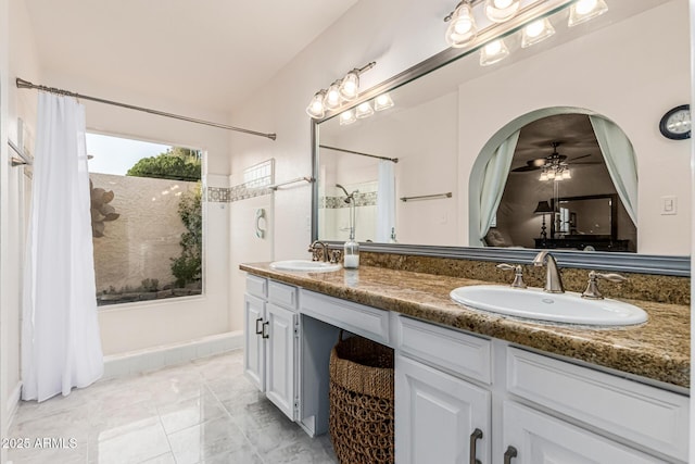8219 E Morgan Trl, Scottsdale, AZ 85258 - bathroom with double vanity, curtained shower, and a ceiling fan