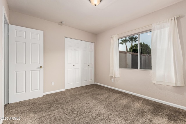 8219 E Morgan Trl, Scottsdale, AZ 85258 - unfurnished bedroom with carpet floors and a closet