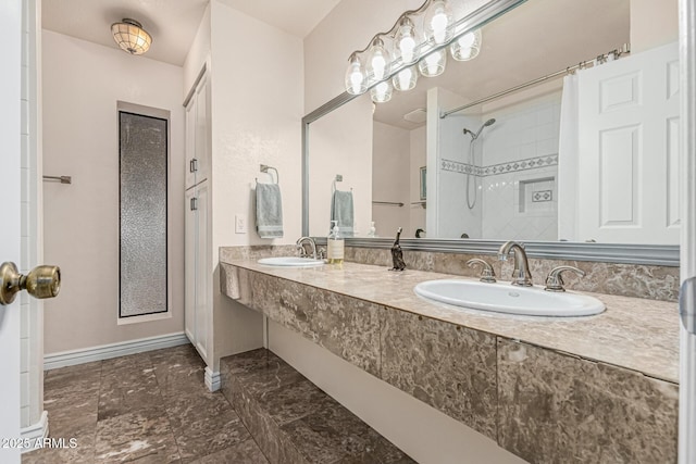 8219 E Morgan Trl, Scottsdale, AZ 85258 - full bathroom with double vanity and a shower