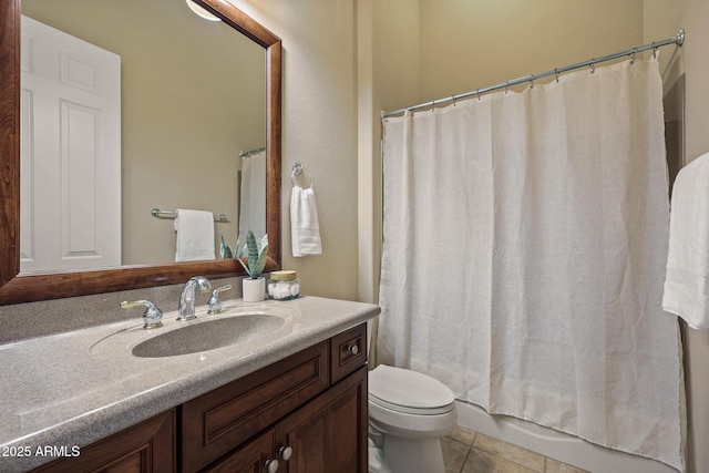 bathroom with shower / tub combo, vanity, toilet, and tile patterned floors