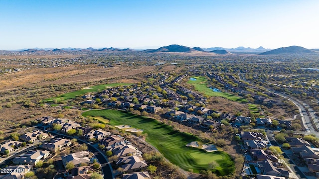 bird's eye view featuring a residential view, view of golf course, and a mountain view