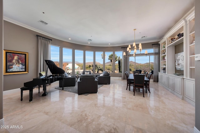 living room featuring marble finish floor, visible vents, a notable chandelier, and ornamental molding