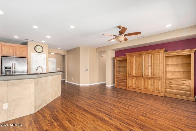 kitchen with visible vents, dark wood-type flooring, stainless steel refrigerator with ice dispenser, open shelves, and recessed lighting