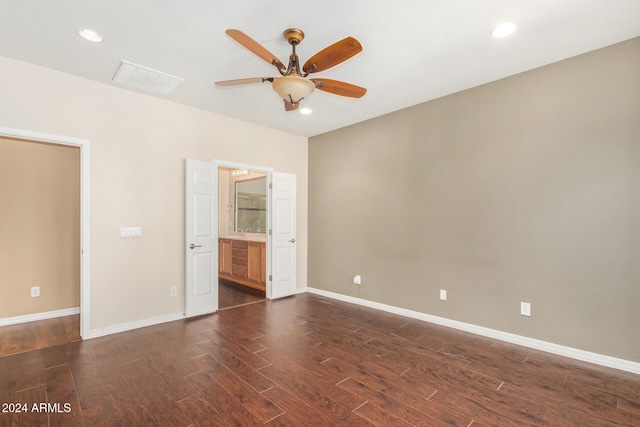 empty room featuring visible vents, recessed lighting, baseboards, ceiling fan, and dark wood-style flooring