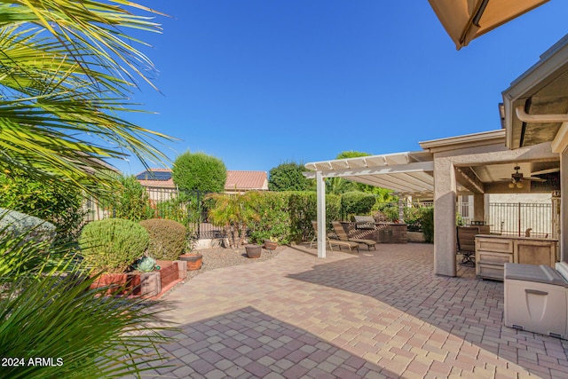 view of patio / terrace with a fenced backyard and a pergola