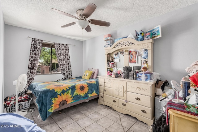 418 E Houser Ave, Buckeye, AZ 85326 - bedroom with light tile patterned flooring, a textured ceiling, and ceiling fan