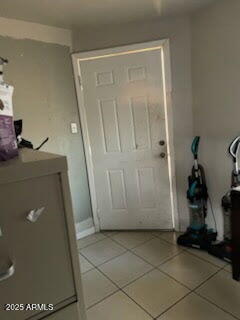 418 E Houser Ave, Buckeye, AZ 85326 - doorway to outside featuring light tile patterned flooring