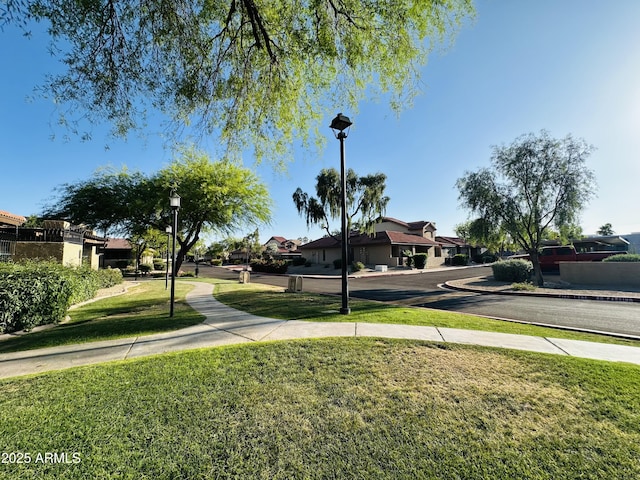 view of yard featuring a residential view