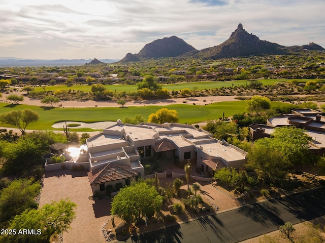 drone / aerial view featuring a mountain view and golf course view