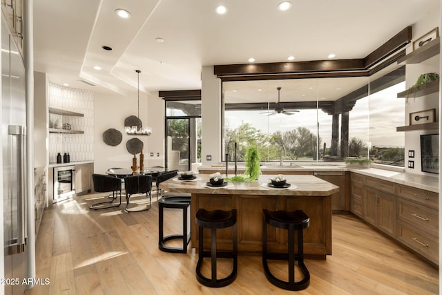 bar featuring a ceiling fan, light wood-style floors, wine cooler, and recessed lighting