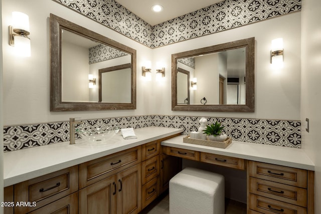 bathroom featuring recessed lighting, tasteful backsplash, and vanity
