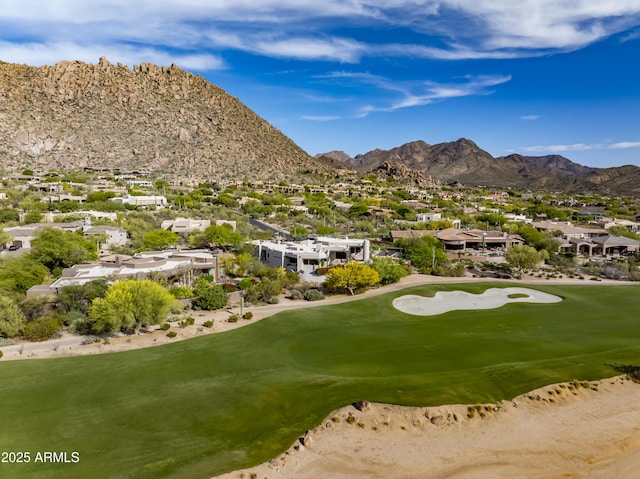 view of home's community featuring a residential view, golf course view, and a mountain view