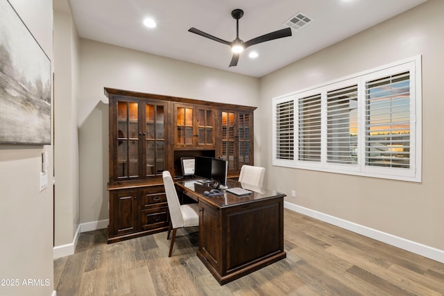 office area with ceiling fan, recessed lighting, wood finished floors, visible vents, and baseboards