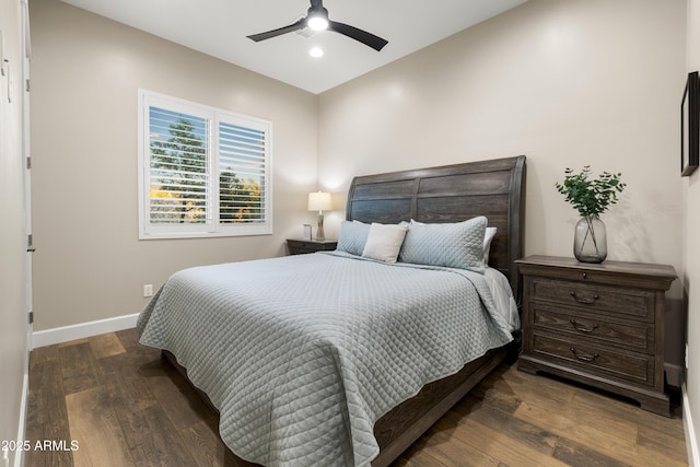 bedroom with ceiling fan, recessed lighting, hardwood / wood-style flooring, and baseboards