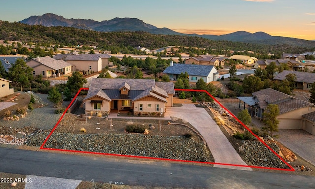 bird's eye view featuring a residential view and a mountain view