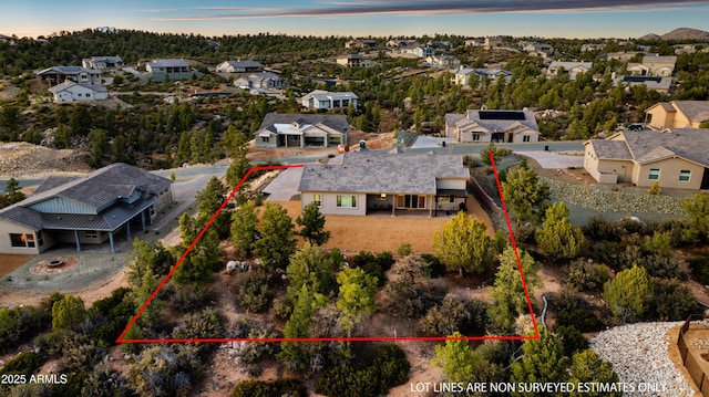 aerial view at dusk with a residential view