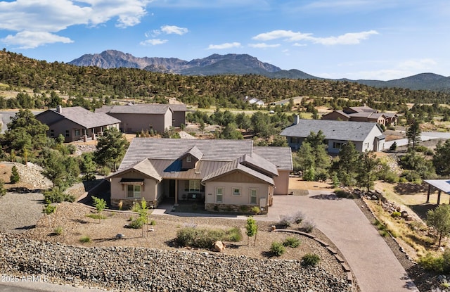 drone / aerial view featuring a mountain view