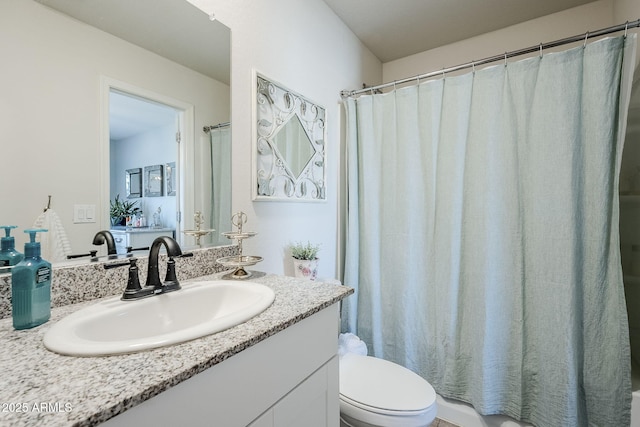 full bath with vanity and toilet