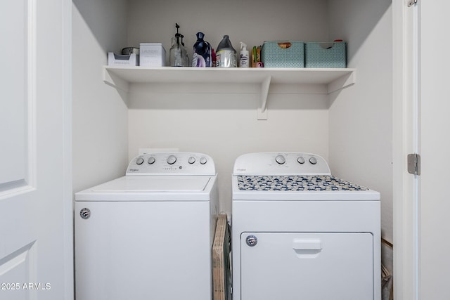 clothes washing area featuring laundry area and independent washer and dryer