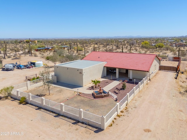 bird's eye view with a rural view and view of desert