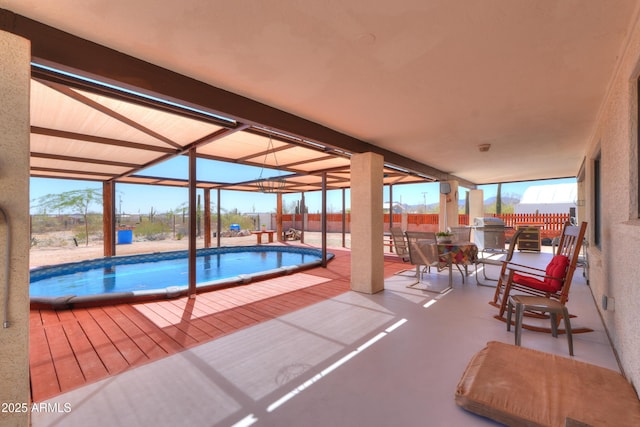 view of pool with a patio, a fenced in pool, and fence