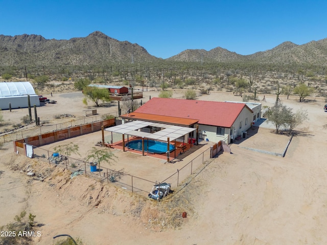bird's eye view featuring a rural view, a mountain view, and a desert view