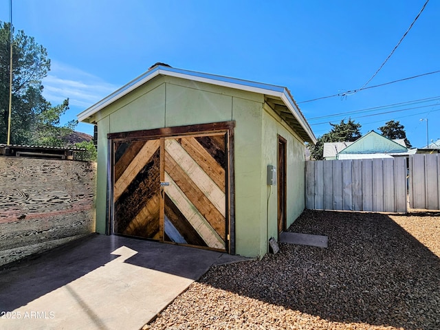 view of shed with a fenced backyard