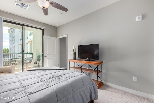 bedroom featuring access to exterior, light colored carpet, and ceiling fan