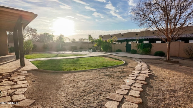 view of yard with a patio and fence